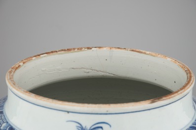 A tall blue and white Chinese porcelain landscape vase, early 18th C.