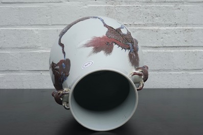 A Chinese hu-shaped deer-handled underglaze red and blue vase with finely painted animals, ca 1900