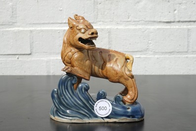 Een Chinees biscuit porseleinen figuur van een kylin, Qianlong, 18e eeuw