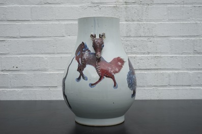 A Chinese hu-shaped deer-handled underglaze red and blue vase with finely painted animals, ca 1900