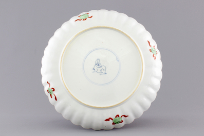 A fine lobed Chinese famille verte porcelain plate with a "zotje", Kangxi, ca. 1700