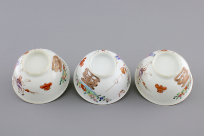 A set of three fine Chinese famille rose cups and two saucers, Yongzheng, and a Chinese Imari teapot, 18th C.