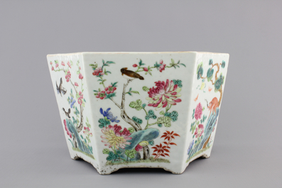 A Chinese hexagonal porcelain famille rose jardiniere with animals and flowers, 19th C.