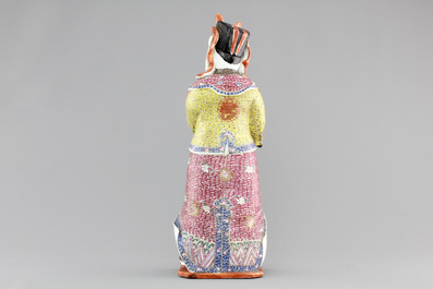 A tall Chinese famille rose porcelain figure of a dignitary, 19th C.