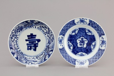 A Chinese blue and white porcelain landscape dish, 3 smaller plates and a saucer, Kangxi, ca. 1700