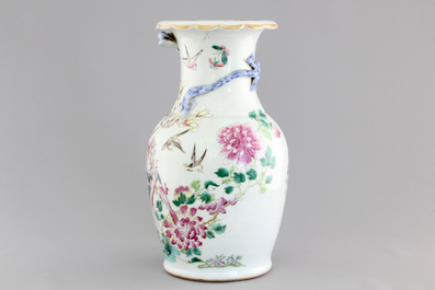 A Chinese porcelain famille rose vase with dragons, 19th C.
