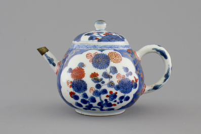 A set of three fine Chinese famille rose cups and two saucers, Yongzheng, and a Chinese Imari teapot, 18th C.