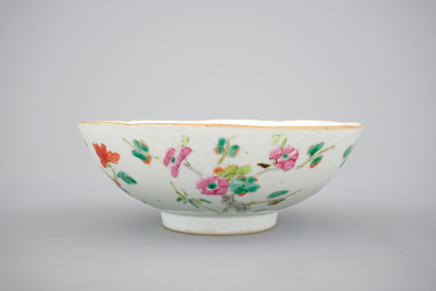 A blue and white Chinese porcelain plate with flowers and a famille rose bowl, 18th C.
