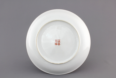 A pair of Chinese famille verte plates, Kangxi, and a famille rose plate, 19/20th C.