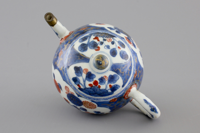 A set of three fine Chinese famille rose cups and two saucers, Yongzheng, and a Chinese Imari teapot, 18th C.