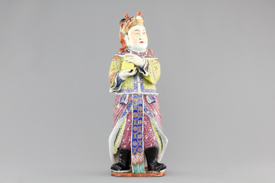 A tall Chinese famille rose porcelain figure of a dignitary, 19th C.