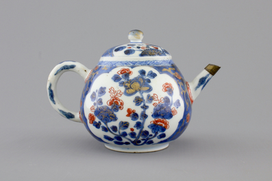 A set of three fine Chinese famille rose cups and two saucers, Yongzheng, and a Chinese Imari teapot, 18th C.