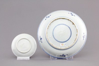 A Chinese blue and white porcelain landscape dish, 3 smaller plates and a saucer, Kangxi, ca. 1700