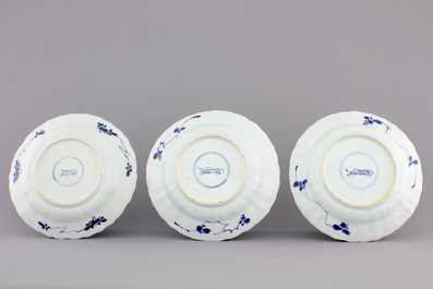 A set of three scalloped blue and white Chinese porcelain landscape plates, Kangxi, ca. 1700