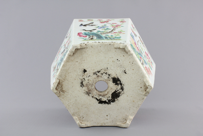 A Chinese hexagonal porcelain famille rose jardiniere with animals and flowers, 19th C.