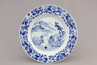 A Chinese blue and white porcelain landscape dish, 3 smaller plates and a saucer, Kangxi, ca. 1700