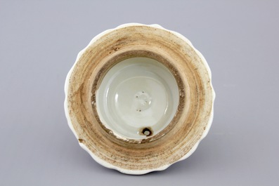 A Chinese famille rose export porcelain teapot and saucer with European subjects, Qianlong, 18th C.