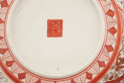 A large Japanese Satsuma porcelain dish with carps, 19th C.