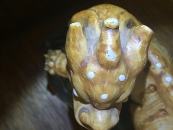 Een Chinees biscuit porseleinen figuur van een kylin, Qianlong, 18e eeuw