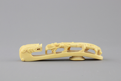 A rare Chinese carved ivory belt hook, 19th C.