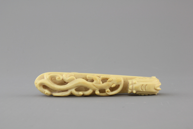 A rare Chinese carved ivory belt hook, 19th C.