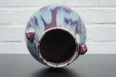 A Chinese porcelain flambe hu-shaped vase with elephant handles, 19/20th C.