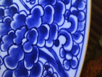 A pair of blue and white Chinese porcelain peony scroll dishes, Kangxi, 18th C.