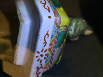A pair of rare hexagonal Chinese famille jaune porcelain vases with figural covers, 19th C.