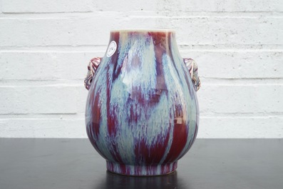 A Chinese porcelain flambe hu-shaped vase with elephant handles, 19/20th C.