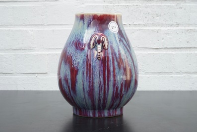 A Chinese porcelain flambe hu-shaped vase with elephant handles, 19/20th C.