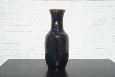 A tall Chinese porcelain flambe glaze vase with elephant handles, 19/20th C.