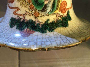 A tall pair of Chinese famille verte crackle glaze vases, Nanking, 19th C.