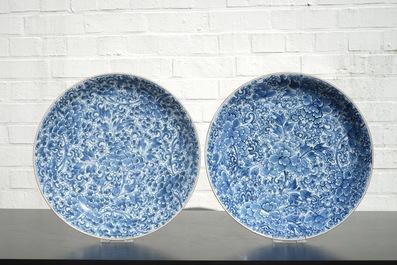 A pair of blue and white Chinese porcelain peony scroll dishes, Kangxi, 18th C.