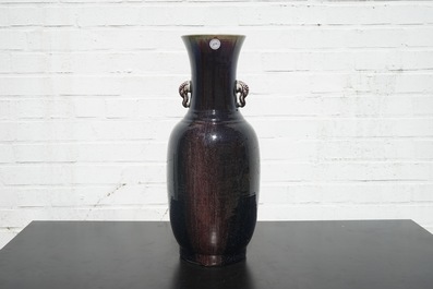 A tall Chinese porcelain flambe glaze vase with elephant handles, 19/20th C.