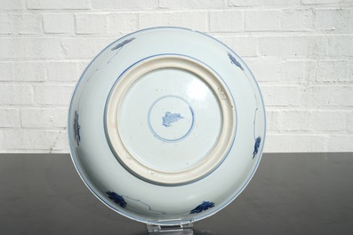A blue and white Chinese porcelain dish with floral scrolls, Kangxi, ca. 1700