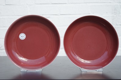A pair of Chinese porcelain copper-red glazed plates, 19/20th C.