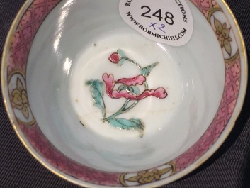A Chinese famille rose and gilt cup and saucer with a harbour scene, Yongzheng, 1722-1735