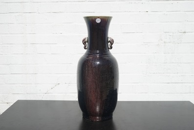 A tall Chinese porcelain flambe glaze vase with elephant handles, 19/20th C.