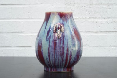 A Chinese porcelain flambe hu-shaped vase with elephant handles, 19/20th C.