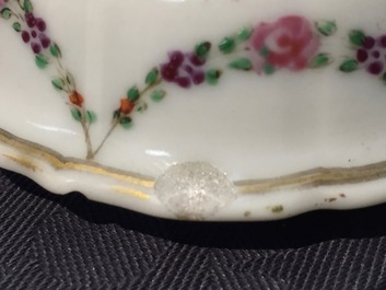 A Chinese famille rose export porcelain teapot and saucer with European subjects, Qianlong, 18th C.