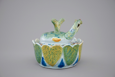 A Dutch Delft polychrome butter tub in the form of a pike, 18th C.