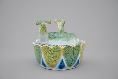A Dutch Delft polychrome butter tub in the form of a pike, 18th C.
