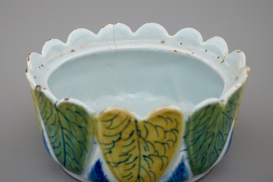 A Dutch Delft polychrome butter tub in the form of a pike, 18th C.