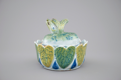 A Dutch Delft polychrome butter tub in the form of a pike, 18th C.