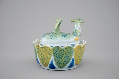 A Dutch Delft polychrome butter tub in the form of a pike, 18th C.