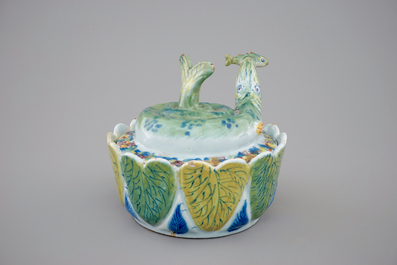 A Dutch Delft polychrome butter tub in the form of a pike, 18th C.