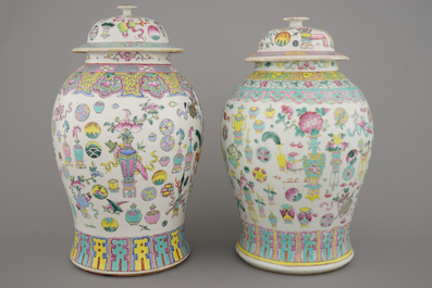 Two Chinese porcelain famille rose jars and covers with scholar's objects, 19th C.