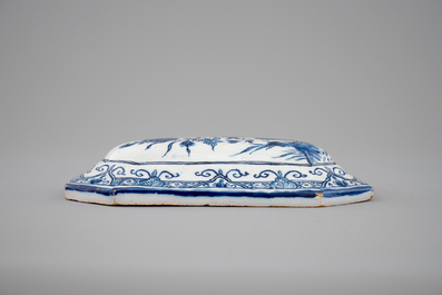 A blue and white Dutch Delft brush back, dated 1753