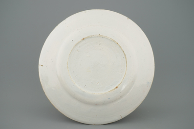 A Dutch Delft mixed technique plate with a pastoral scene, 18th C.