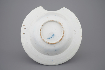 A blue and white Dutch Delft shaving bowl, early 18th C.